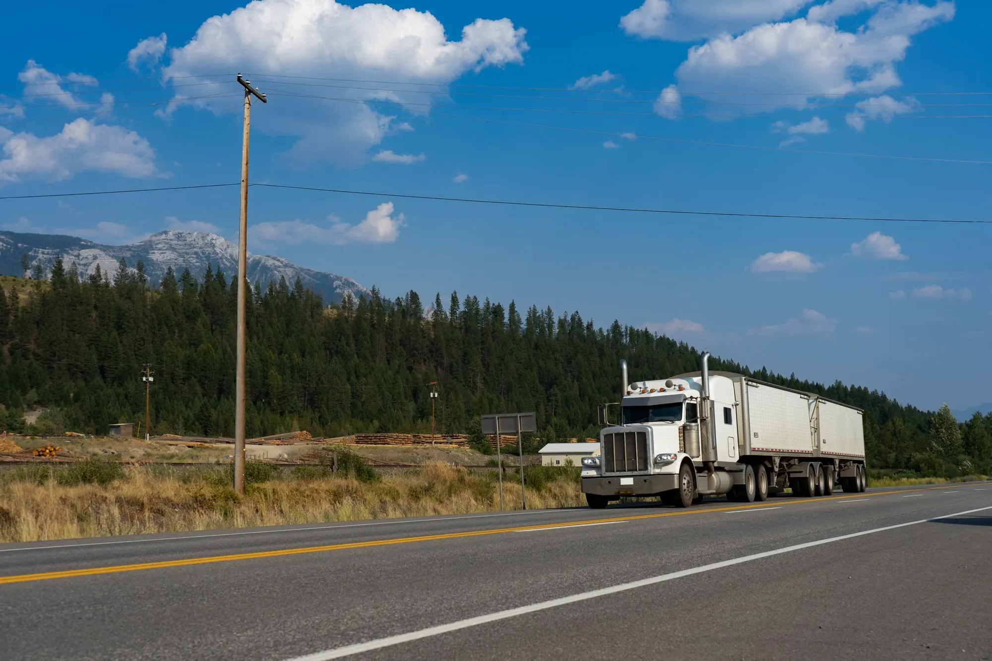Semi-truck travelling through a New Jersey corridor