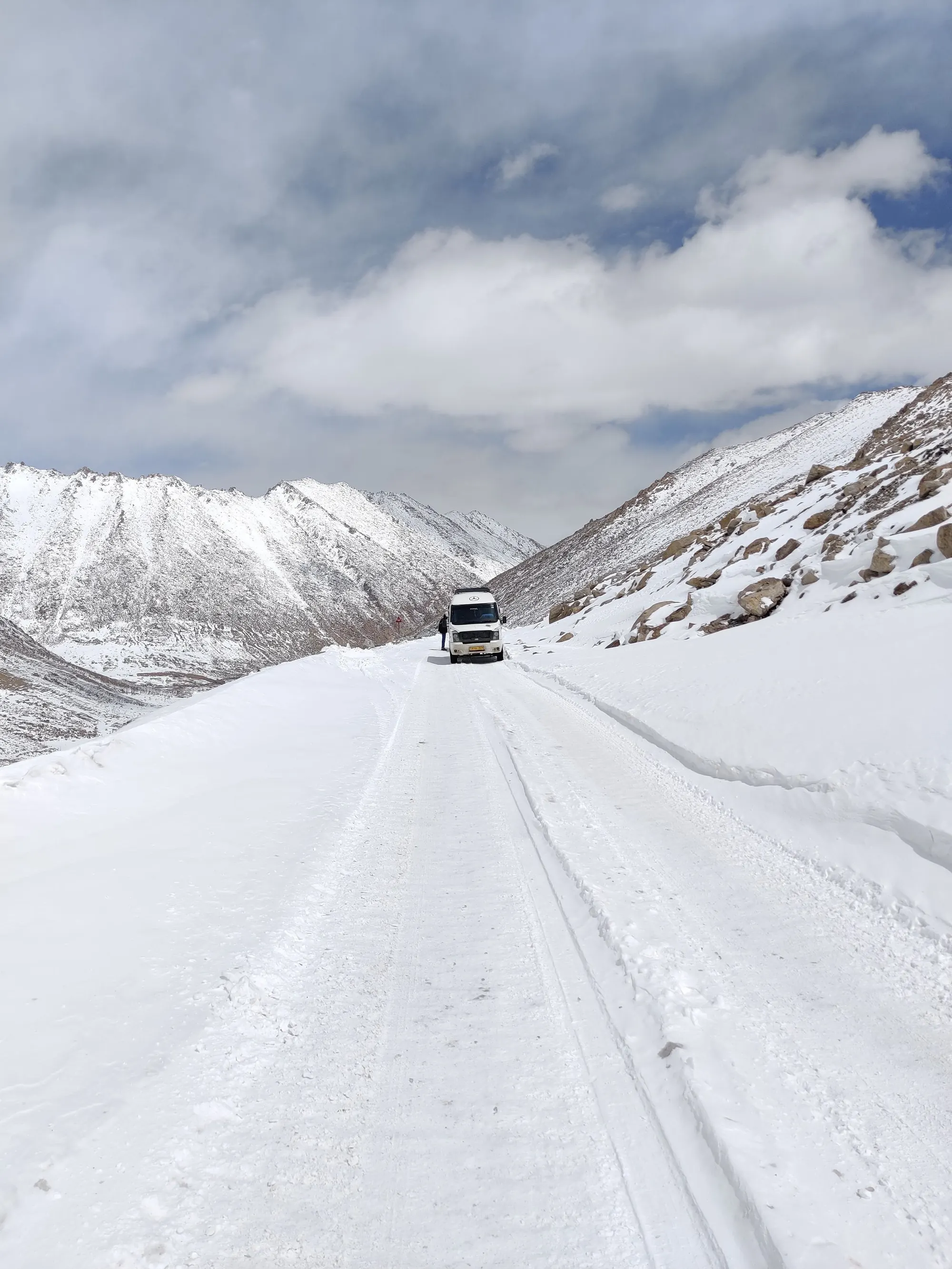 Refrigerated truck moving through a snowy New Jersey road