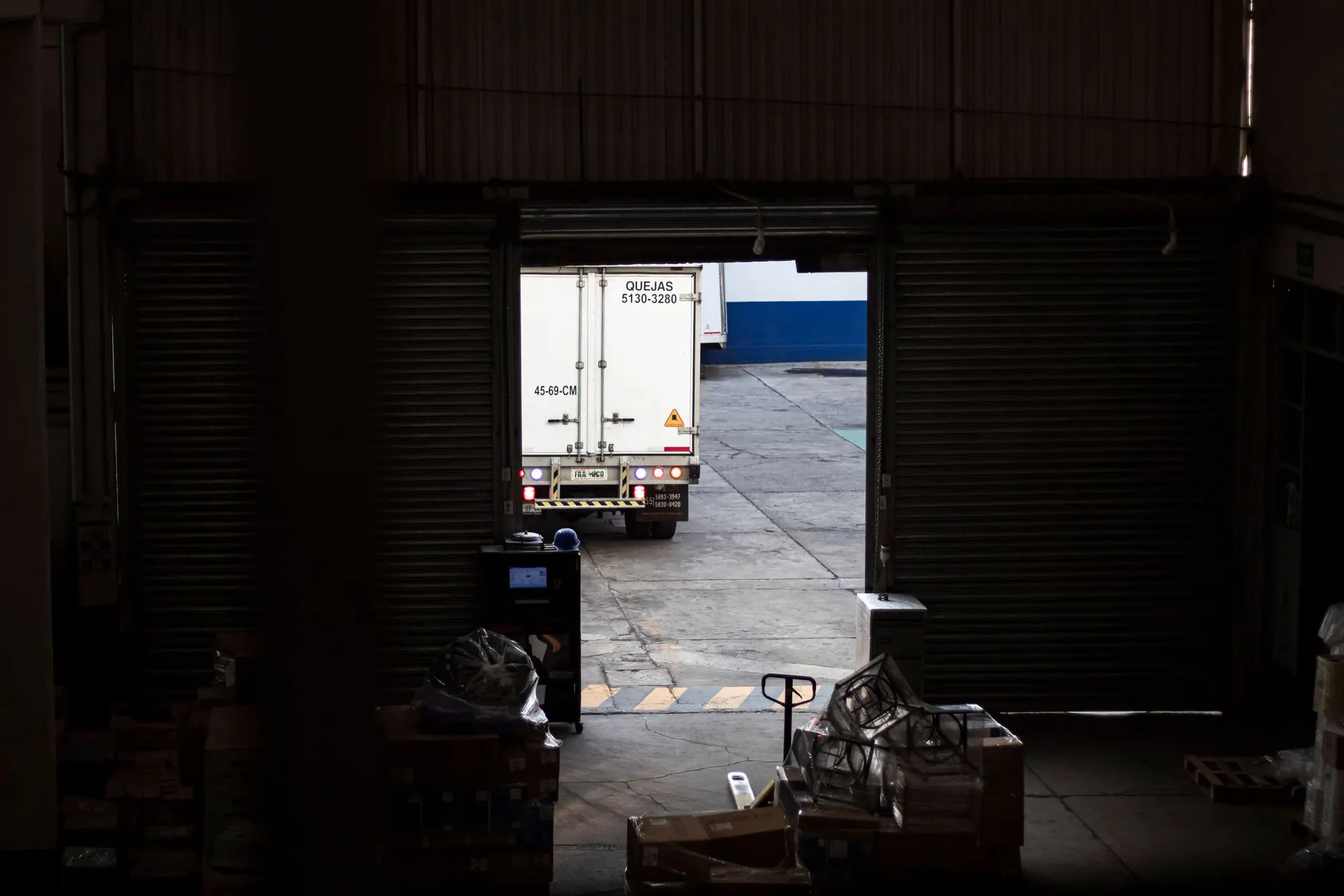 Refrigerated freight truck at a loading dock